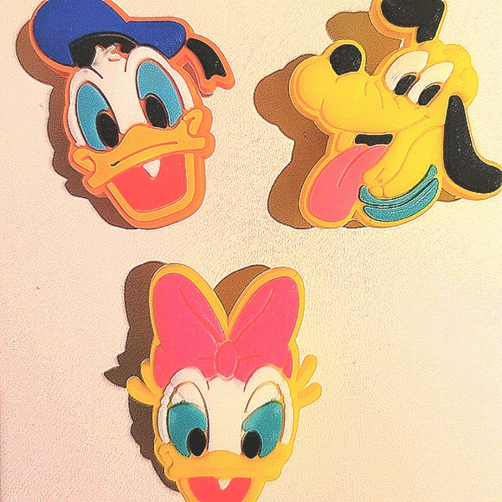 Donald, Daisy, and Pluto jibbitz for crocs